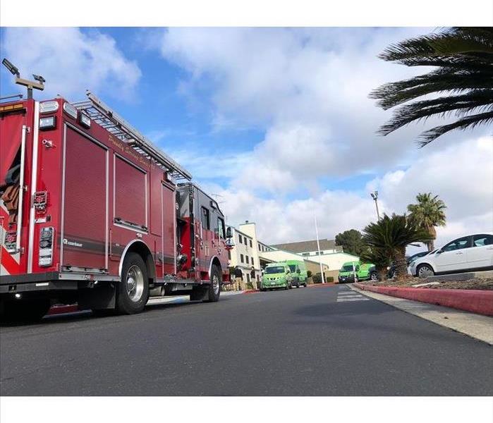 fire truck and servpro vehichles